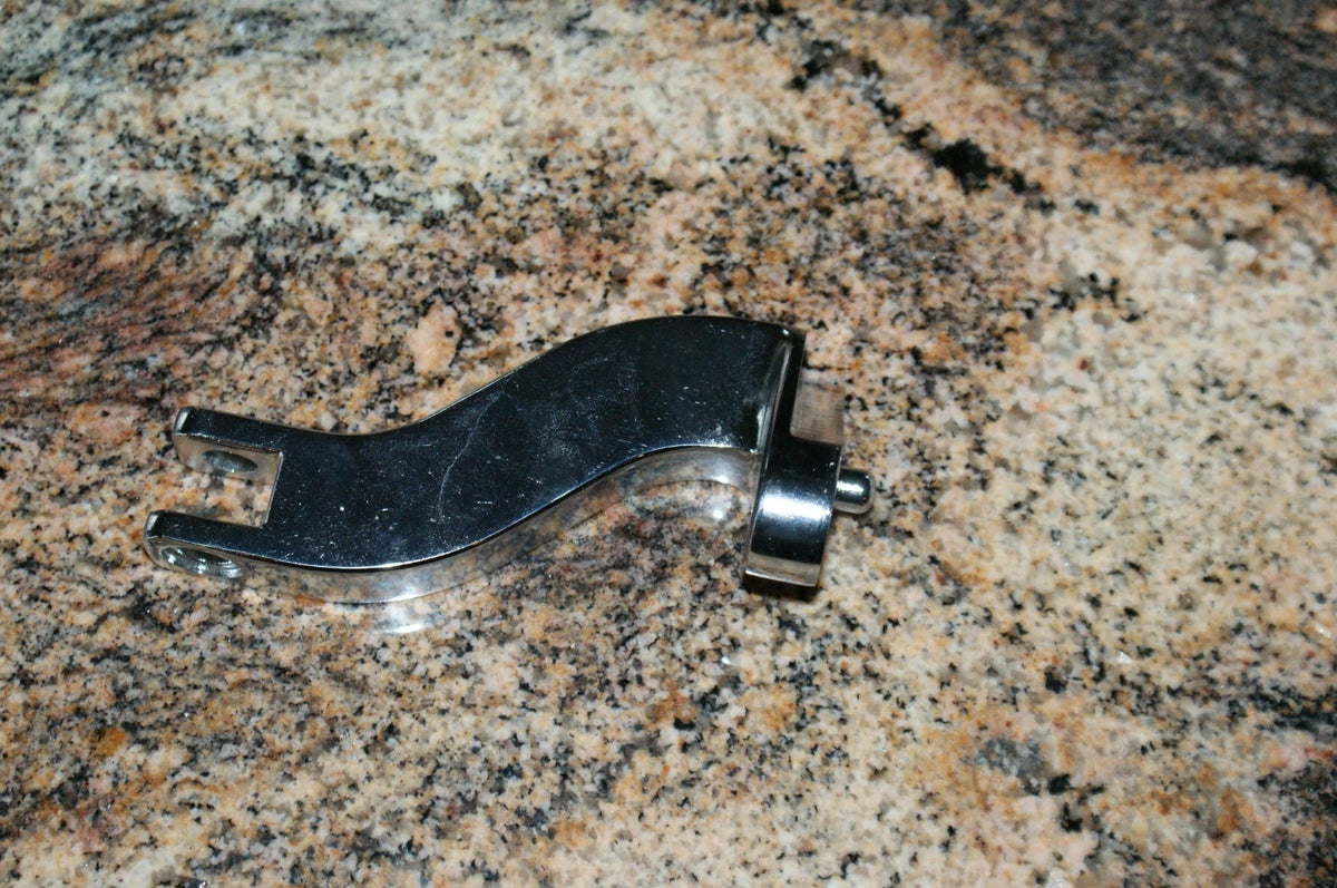 NOS Harley Davidson chome foot rest mount 49036-04 LEFT